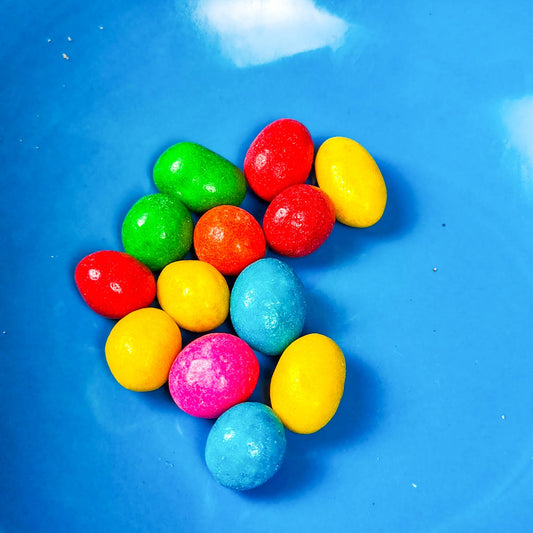 Huevitos. (6 unidades). Chocolate con mani confitado. 25g. Confiteria americana